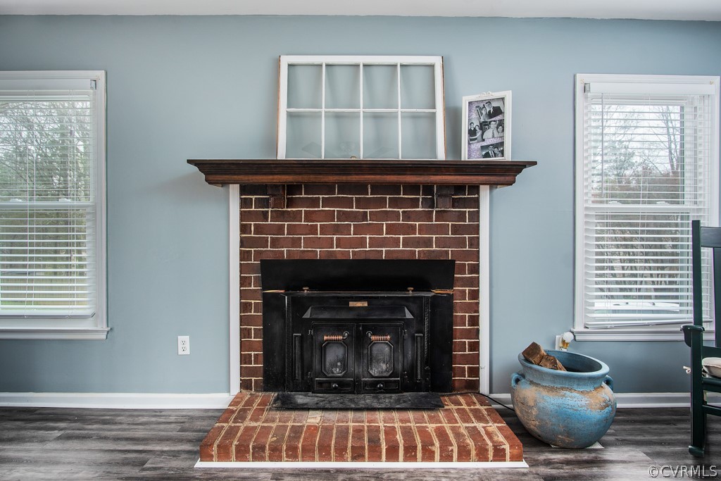 4404 Rabbit Foot Place Chesterfield, VA 23236 - Photo 16 of 32 a living room with furniture a window and a fireplace
