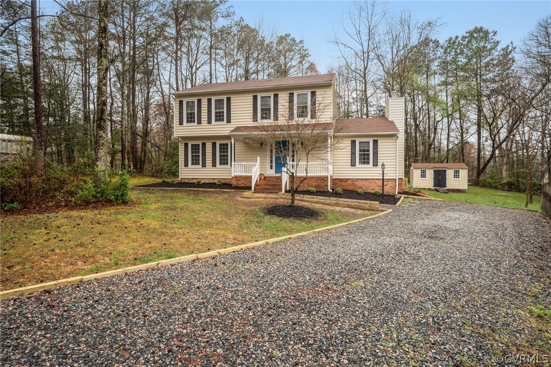 4404 Rabbit Foot Place Chesterfield, VA 23236 - Photo 2 of 32 a front view of a house with a yard