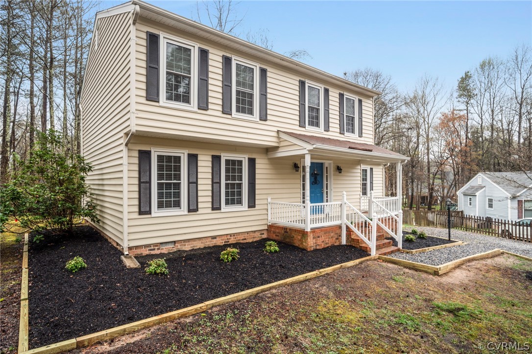 4404 Rabbit Foot Place Chesterfield, VA 23236 - Photo 3 of 32 a front view of a house with a patio