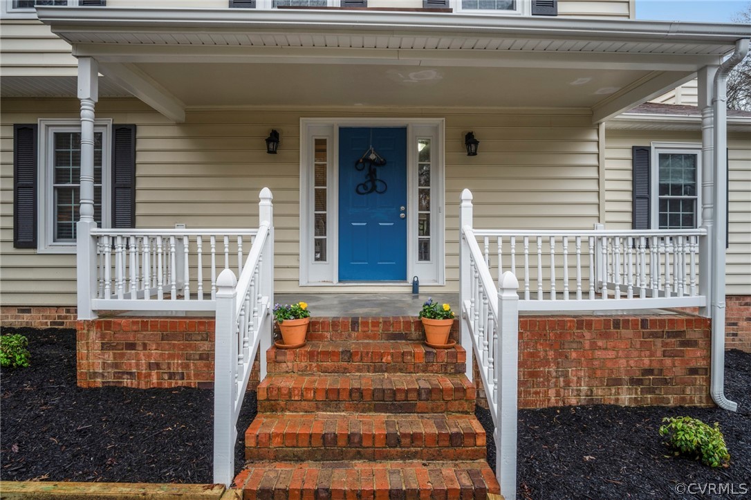 4404 Rabbit Foot Place Chesterfield, VA 23236 - Photo 4 of 32 a front view of a house with a porch