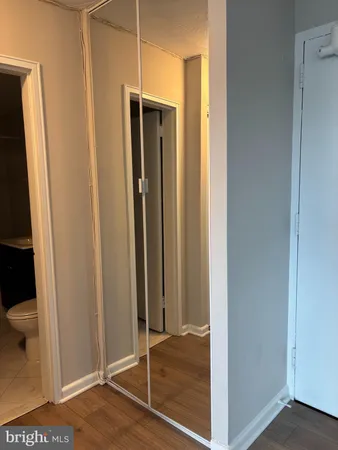 a view of a bathroom with a glass door