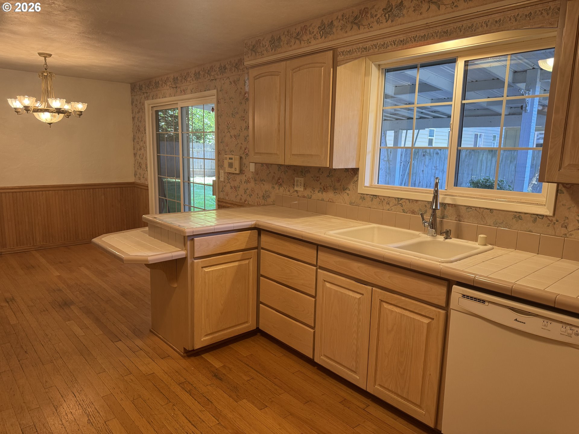 260 Susan Street Eugene, OR 97404 - Photo 10 of 33 a kitchen with a sink cabinets and window