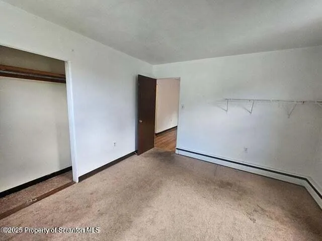 a bathroom with a sink a toilet and bathtub