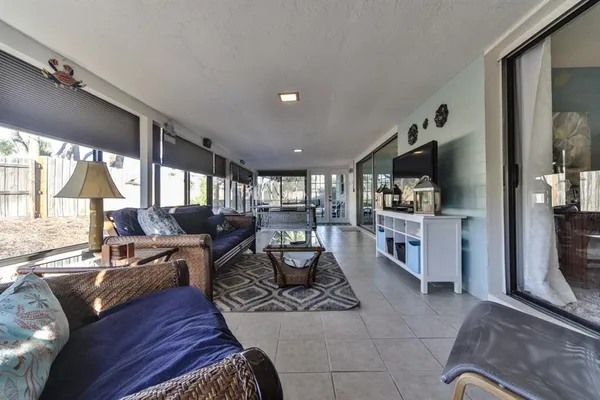 a view of balcony with furniture