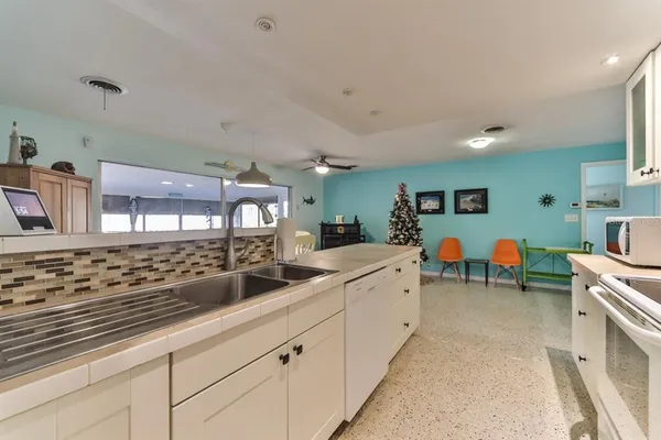 a large kitchen with lots of counter top space