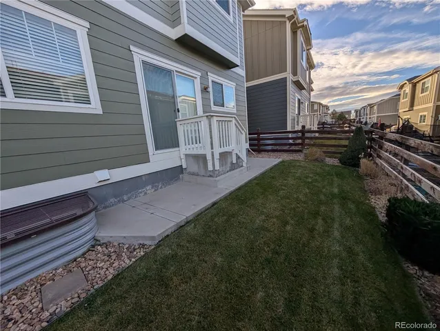 a view of a back yard of the house