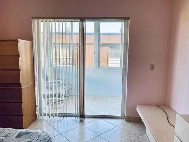 a view of a room with a large window