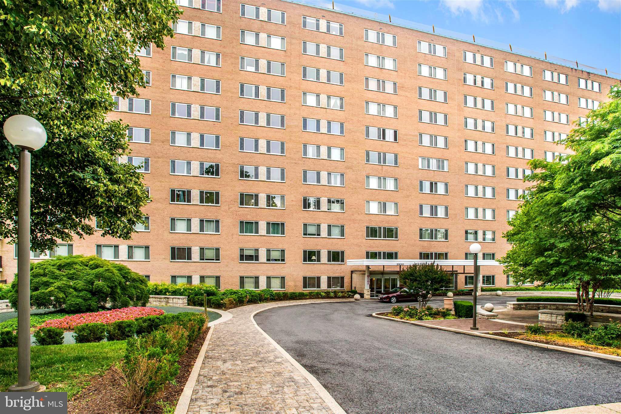 1900 Lyttonsville Road, Unit 1101 Silver Spring, MD 20910 - Photo 18 of 24 a view of a building with a street