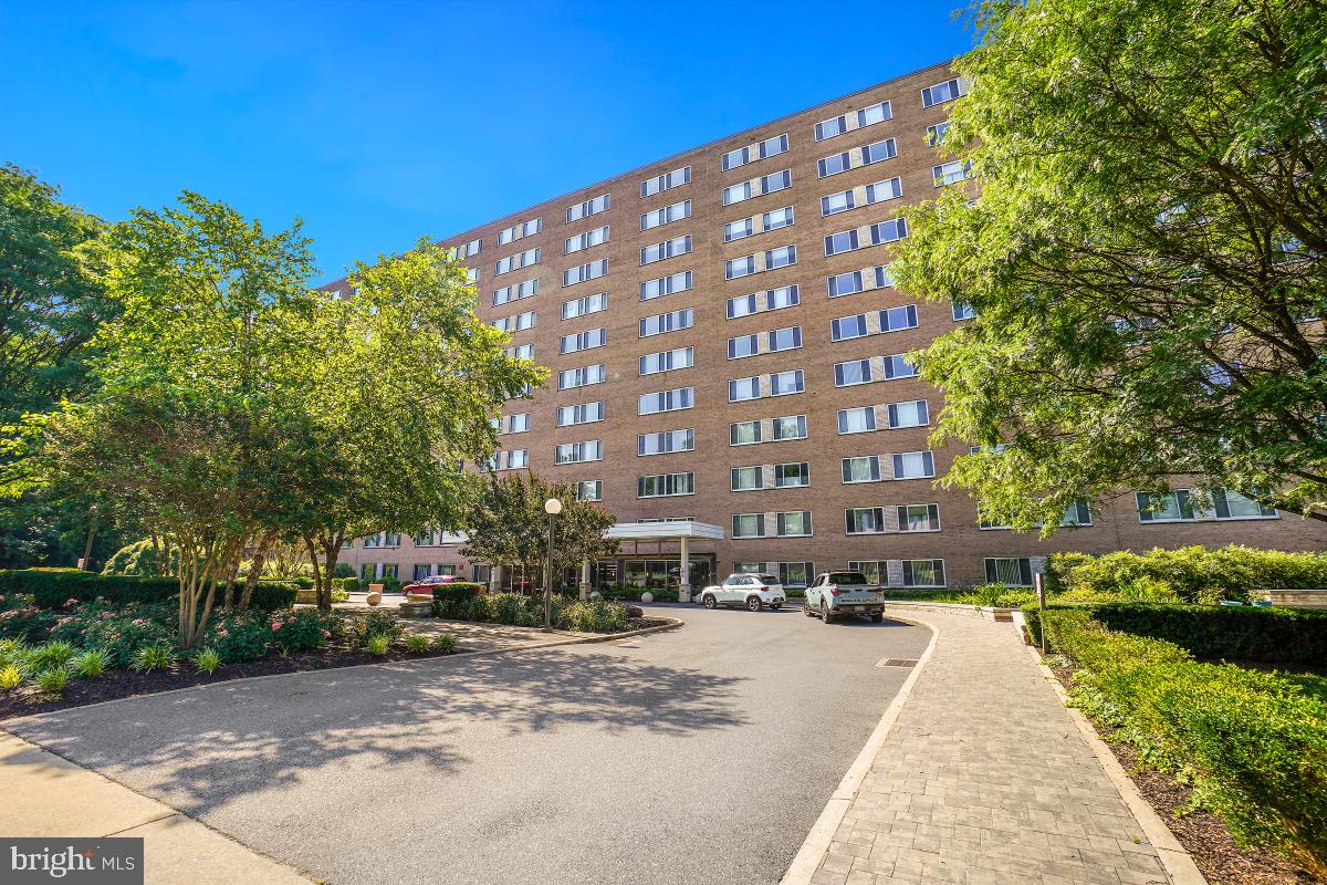 1900 Lyttonsville Road, Unit 1101 Silver Spring, MD 20910 - Photo 19 of 24 a view of a building with a yard