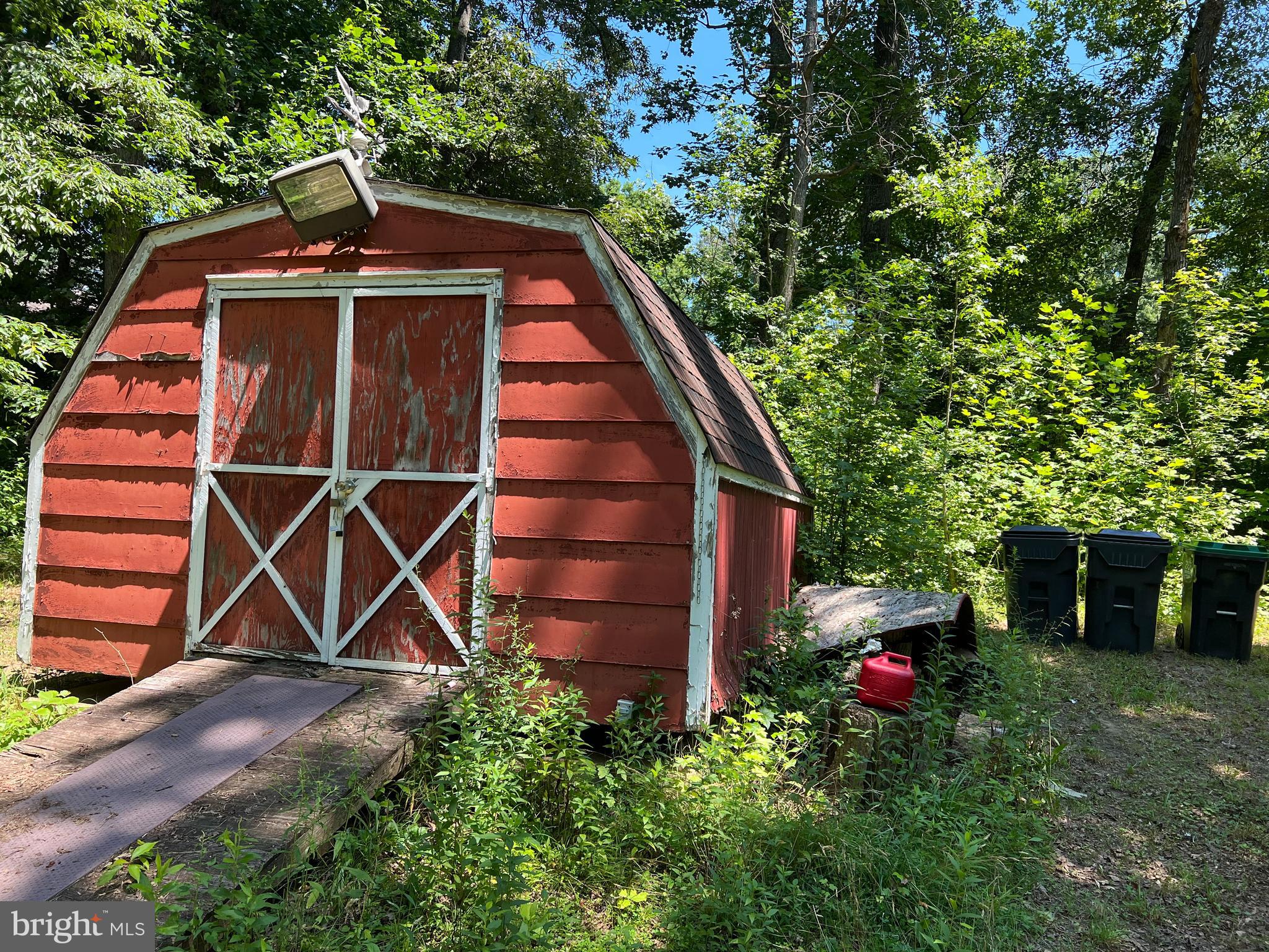 5331 Partlow Road Partlow, VA 22534 - Photo 30 of 45 Closest shed has a new roof. Dog may be inside.