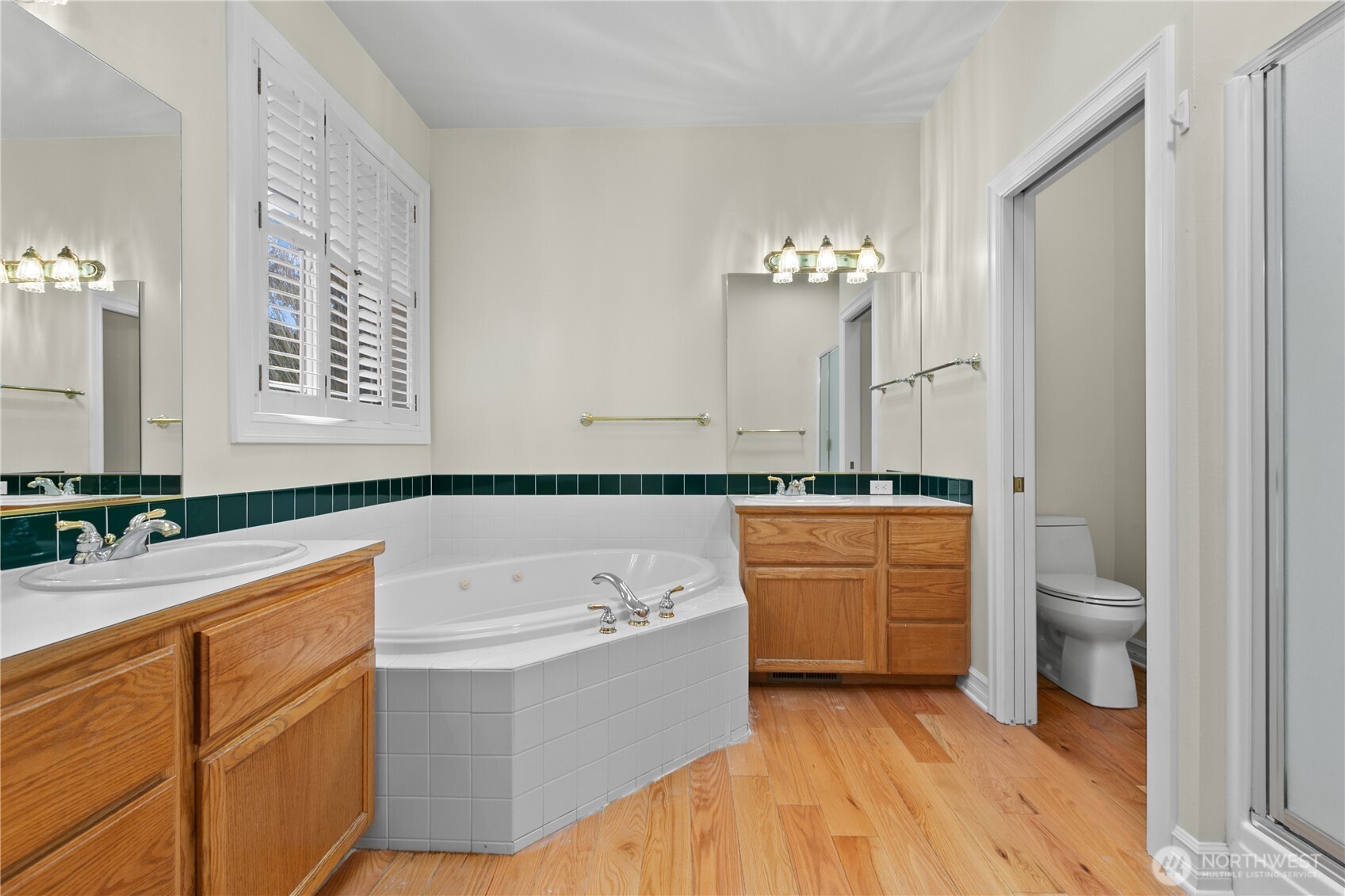 13796 Seaview Way Anacortes, WA 98221 - Photo 18 of 39 a bathroom with a tub sink and mirror