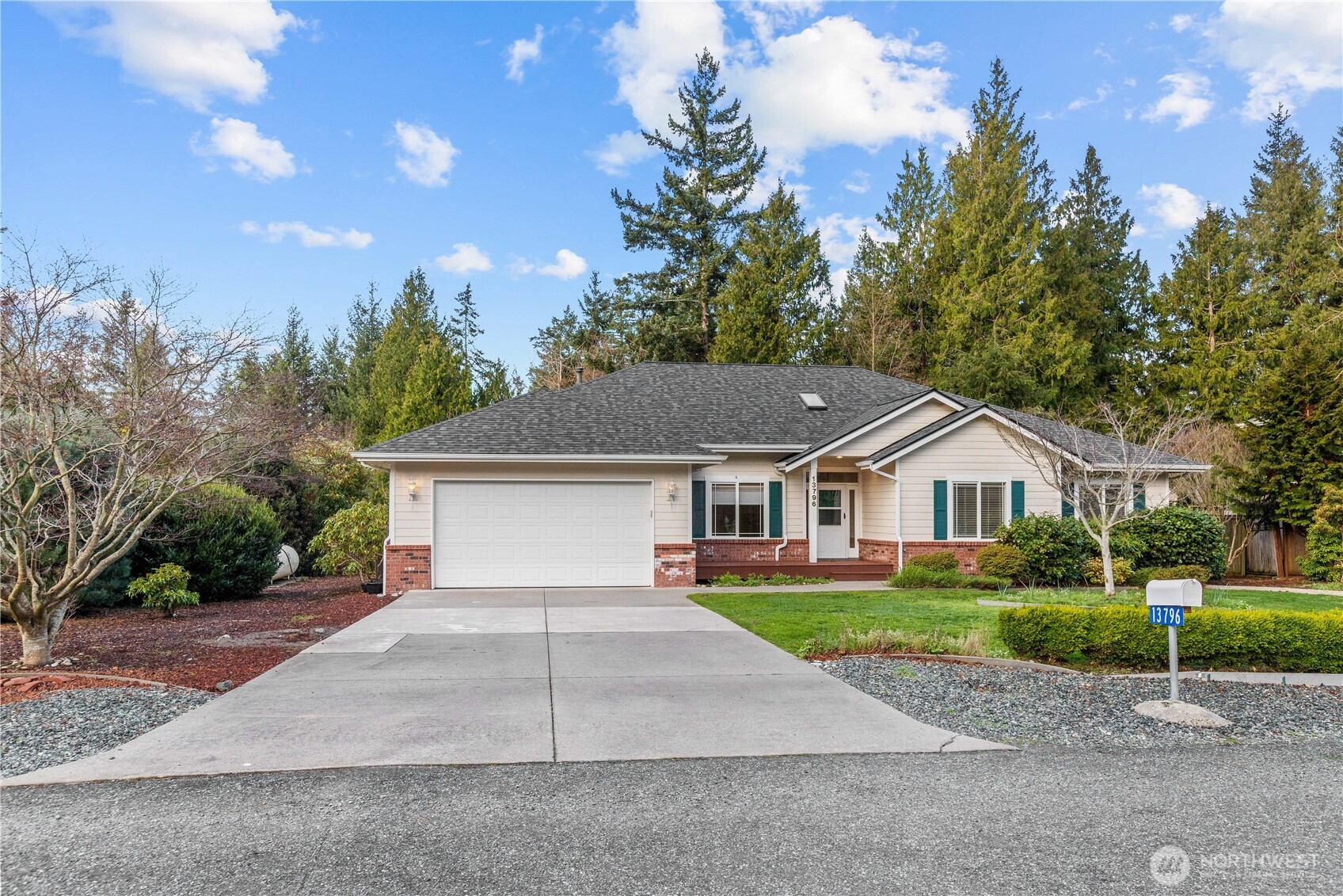13796 Seaview Way Anacortes, WA 98221 - Photo 4 of 39 a house view with a garden space