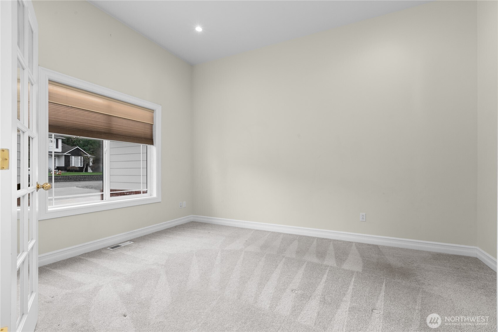 13796 Seaview Way Anacortes, WA 98221 - Photo 6 of 39 a view of an empty room with a window