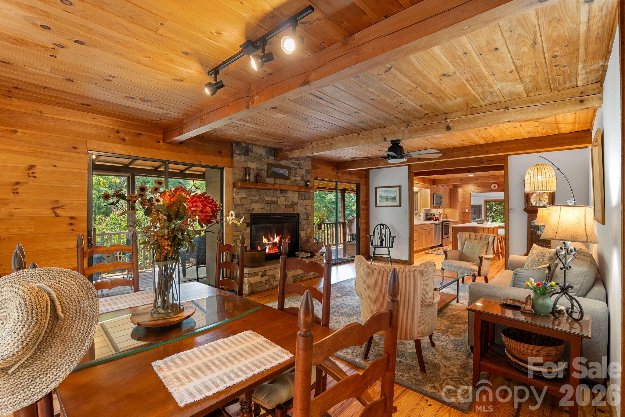 150 Avondale Ridge Road Asheville, NC 28803 - Photo 15 of 45 a living room with furniture and a fireplace