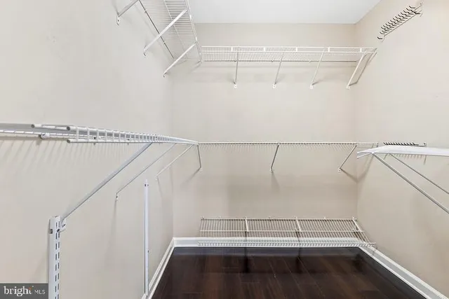 a view of a room with racks on the wall