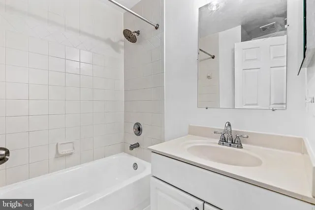 a bathroom with a sink and a bathtub