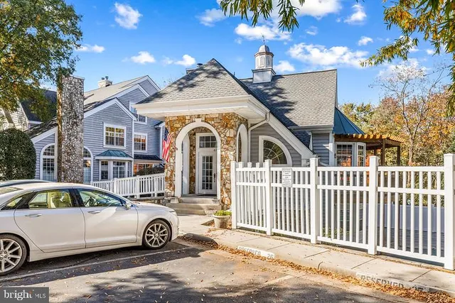 a front view of a house with parking yard