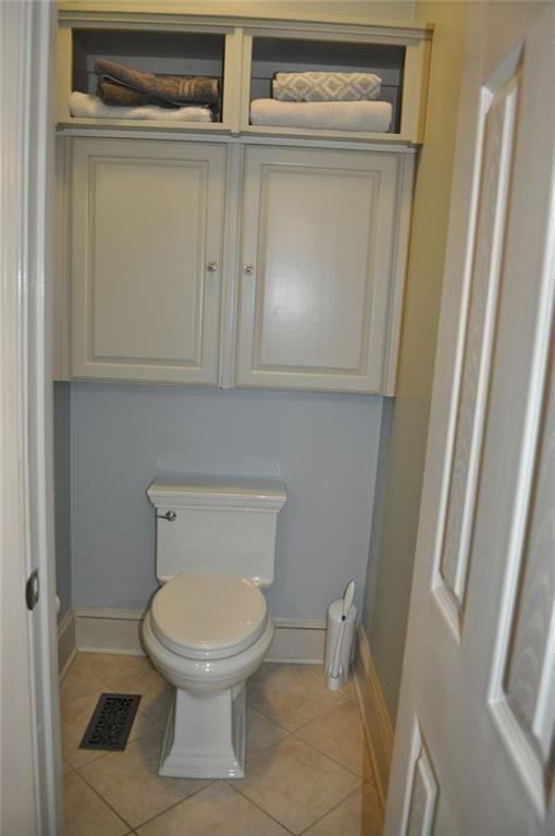 731 Hidden Lakes Trail Jefferson, GA 30549 - Photo 33 of 70 a bathroom with a toilet and a sink