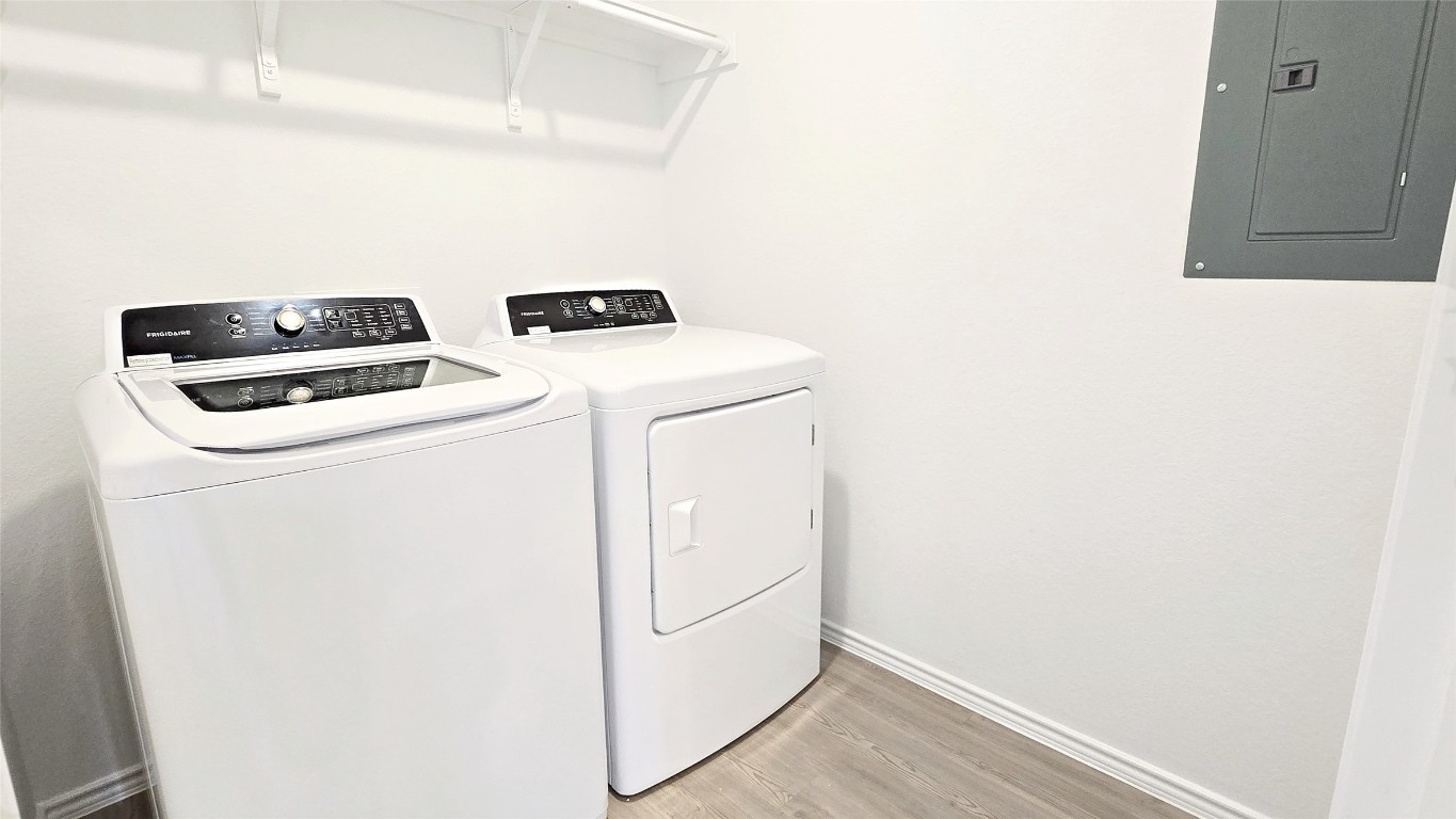 1637 Chapel Ranch Road Georgetown, TX 78628 - Photo 11 of 14 a utility room with dryer and washer