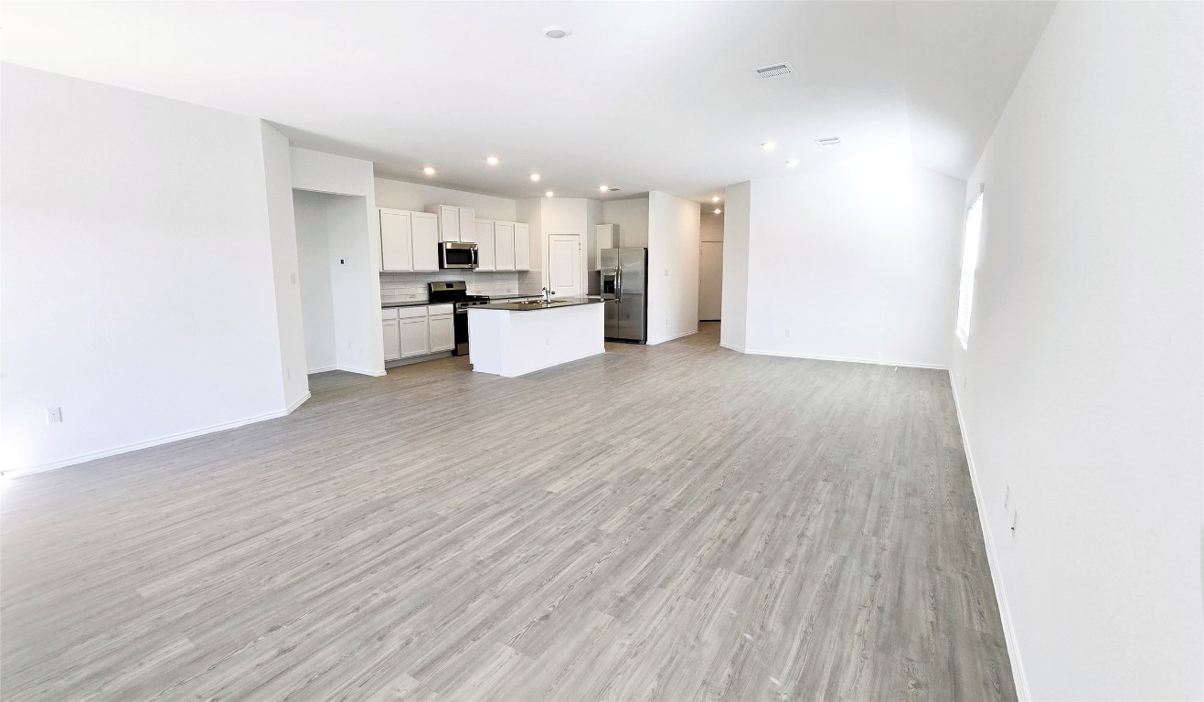 1637 Chapel Ranch Road Georgetown, TX 78628 - Photo 2 of 14 a view of kitchen view wooden floor and window