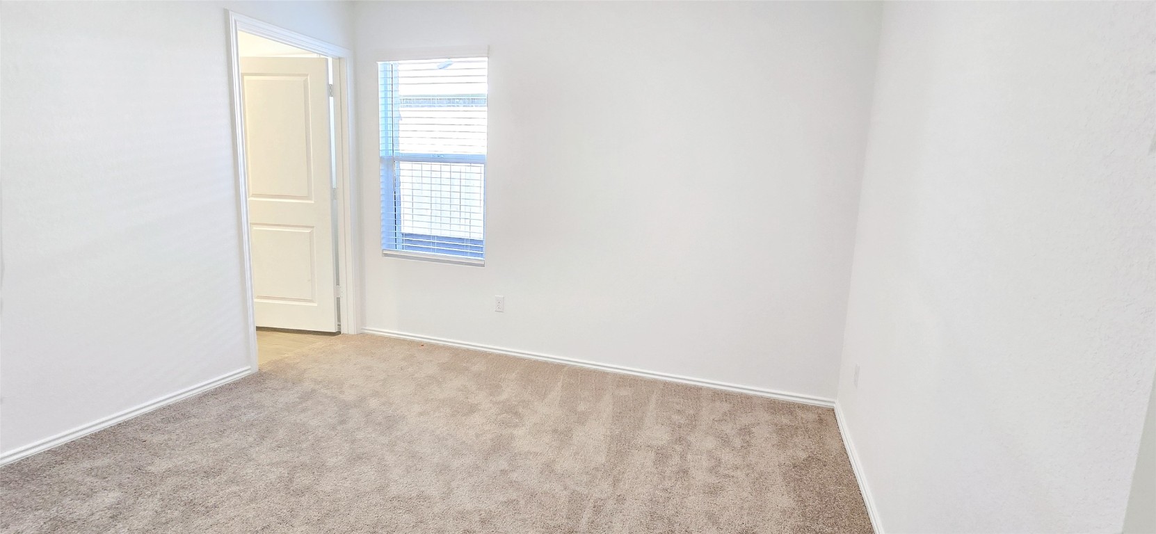 1637 Chapel Ranch Road Georgetown, TX 78628 - Photo 7 of 14 a view of an empty room with a window