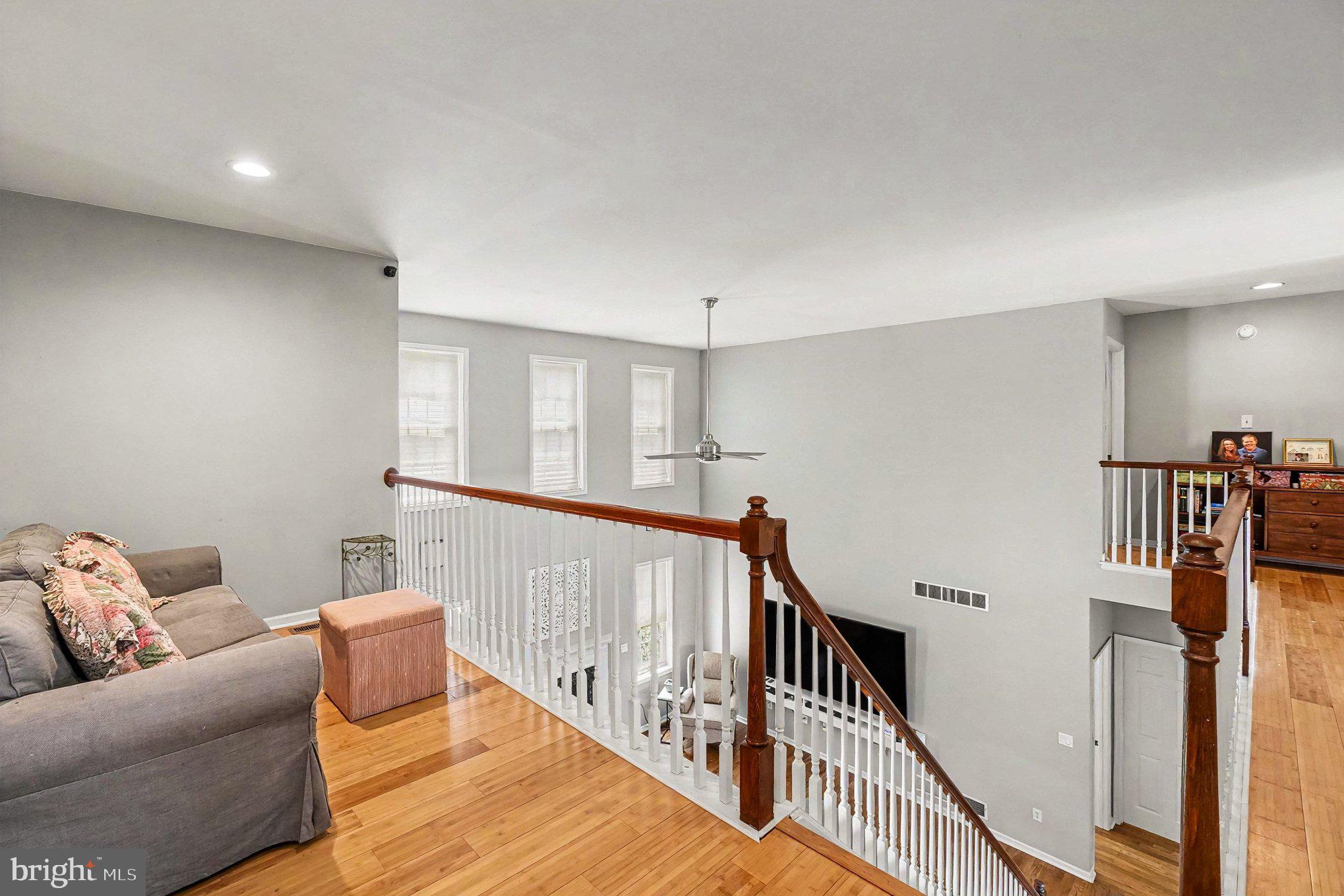 64 Open Meadow Court Elkton, MD 21921 - Photo 28 of 57 a view of livingroom with furniture and stairs