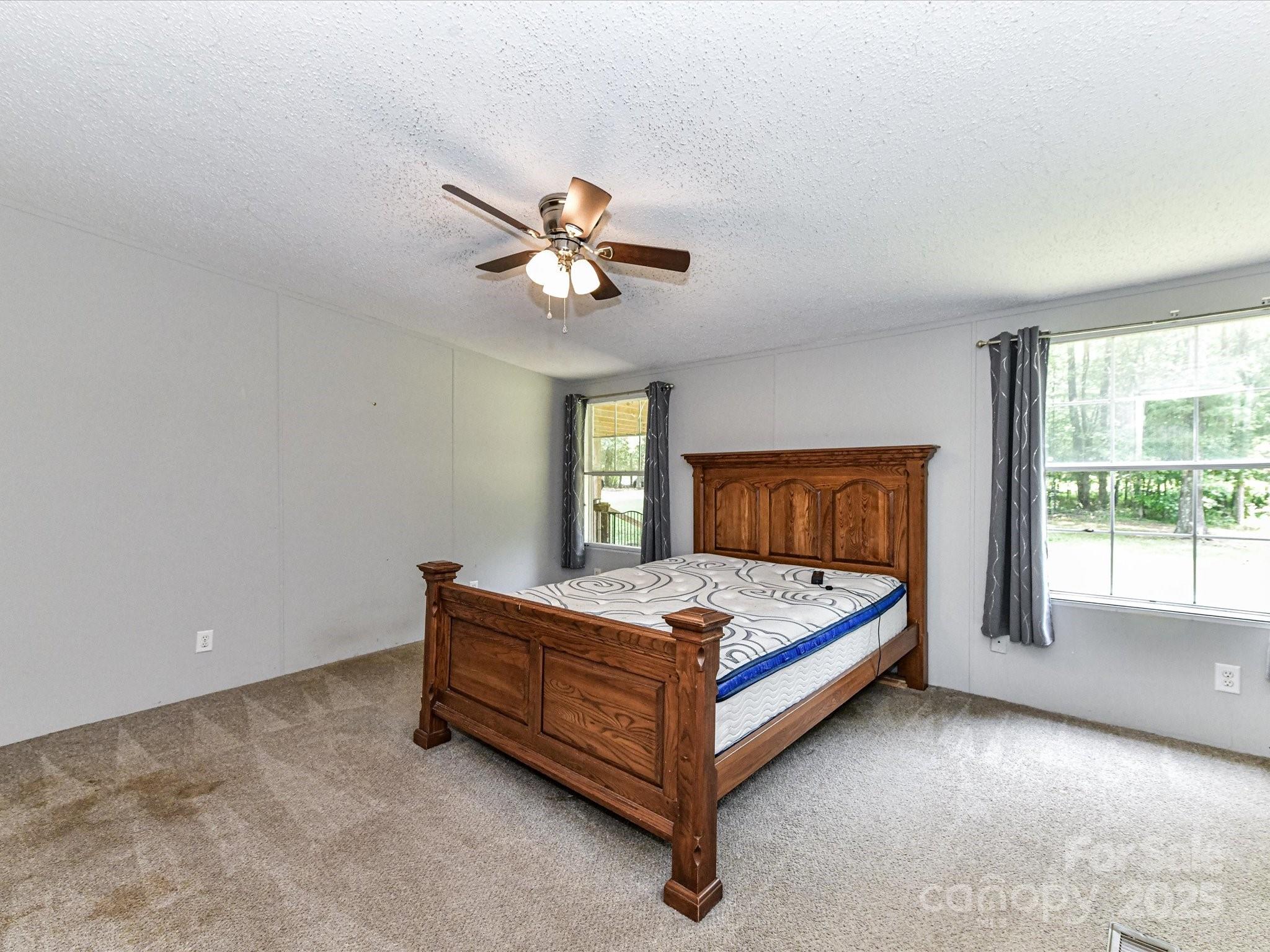 615 Hawley Road McConnells, SC 29726 - Photo 15 of 47 a bedroom with a bed and window