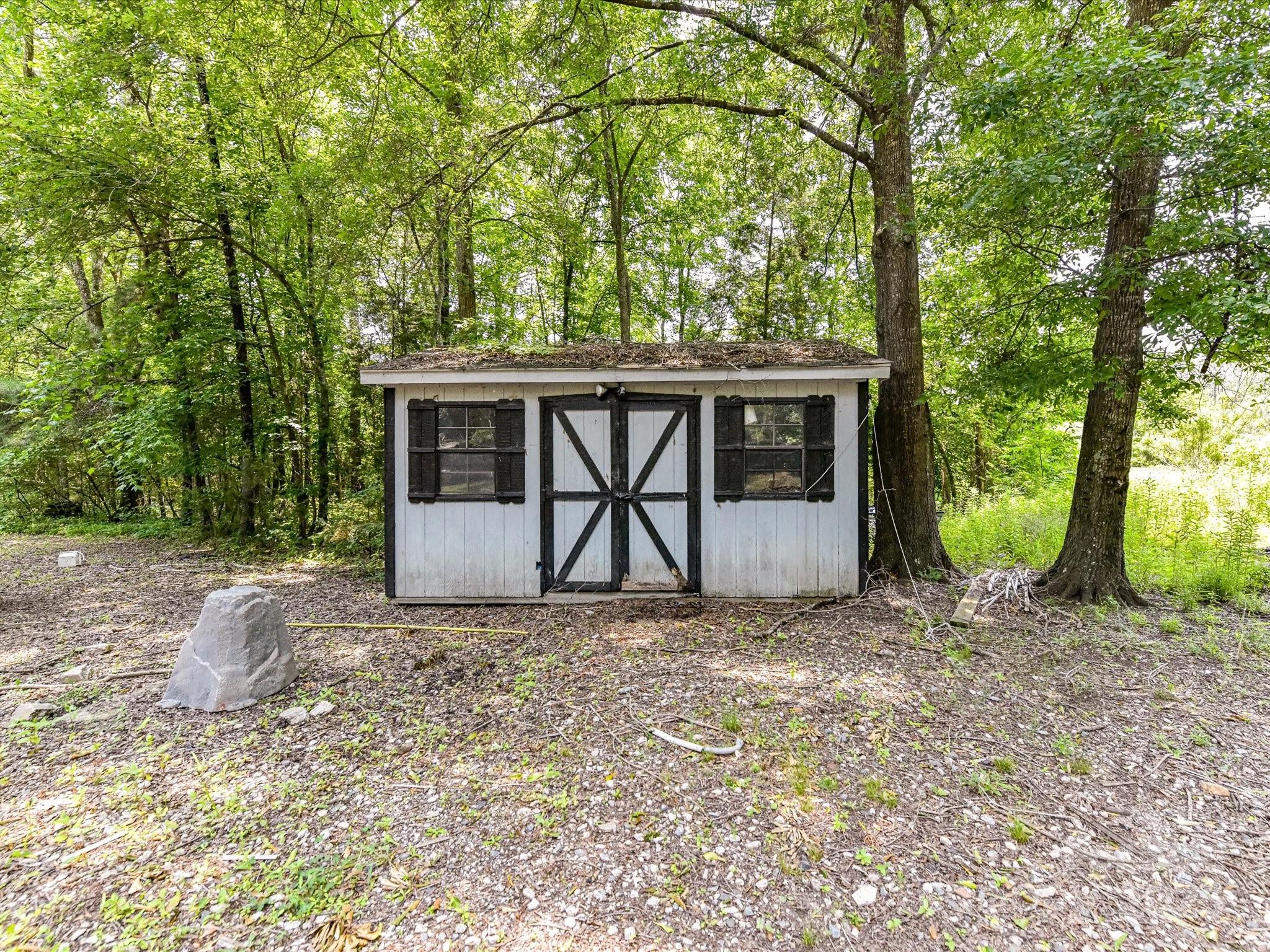 615 Hawley Road McConnells, SC 29726 - Photo 26 of 47 a view of a house with backyard and a tree