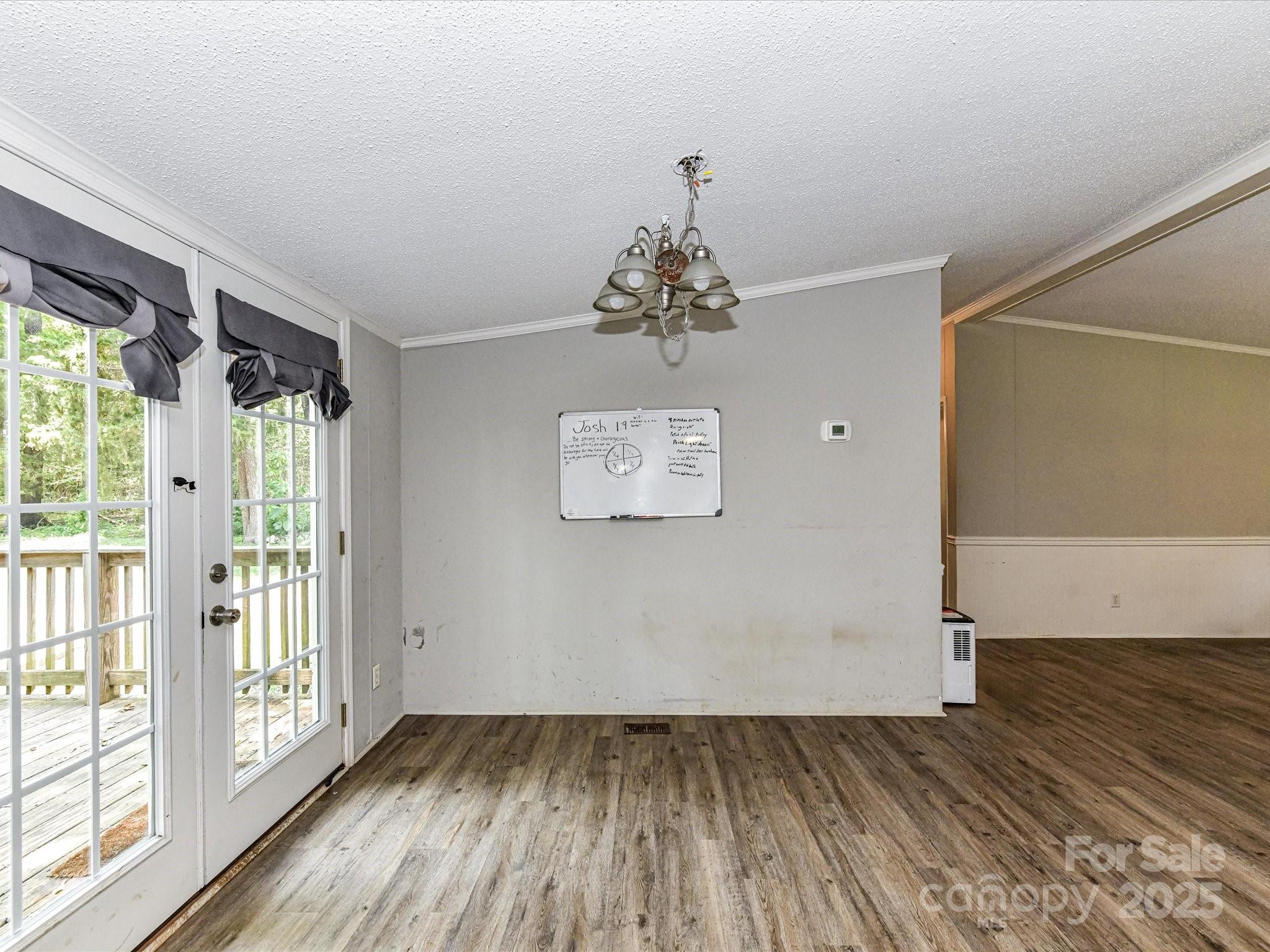 615 Hawley Road McConnells, SC 29726 - Photo 9 of 47 wooden floor in an empty room with a window