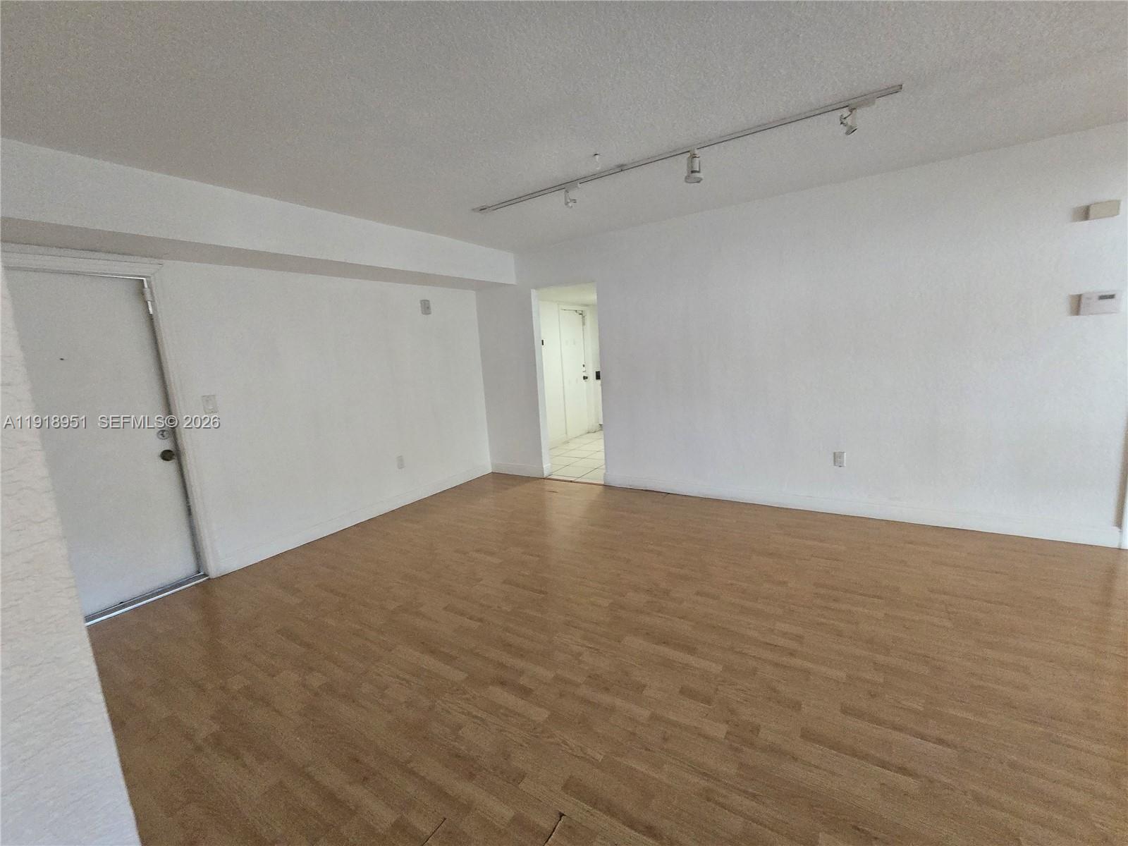 7925 Southwest 104th Street, Unit 201E Miami, FL 33156 - Photo 13 of 32 a view of empty room