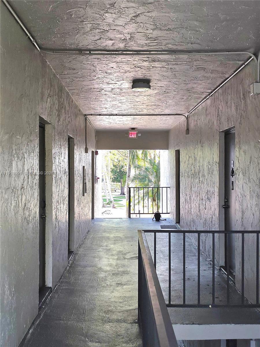 7925 Southwest 104th Street, Unit 201E Miami, FL 33156 - Photo 10 of 32 a view of a porch