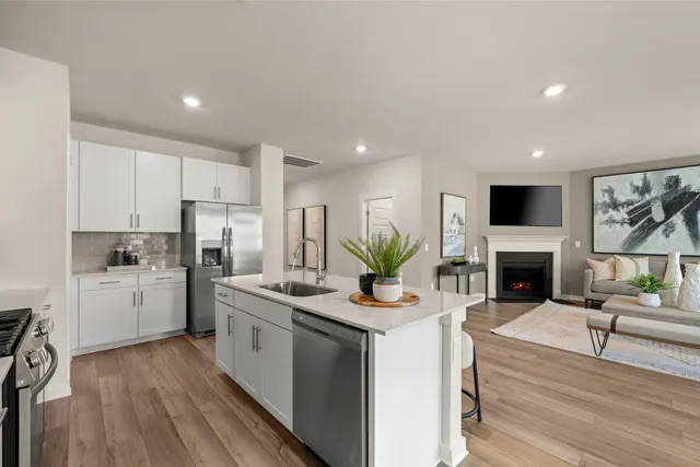a living room with furniture fireplace and a flat screen tv