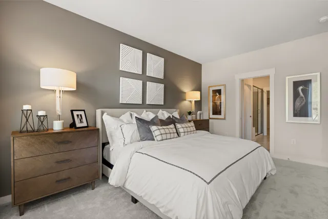 a bathroom with a shower and a glass door
