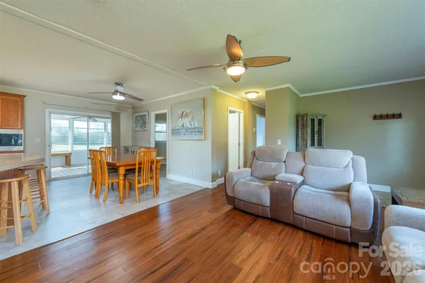 a living room with furniture and a table