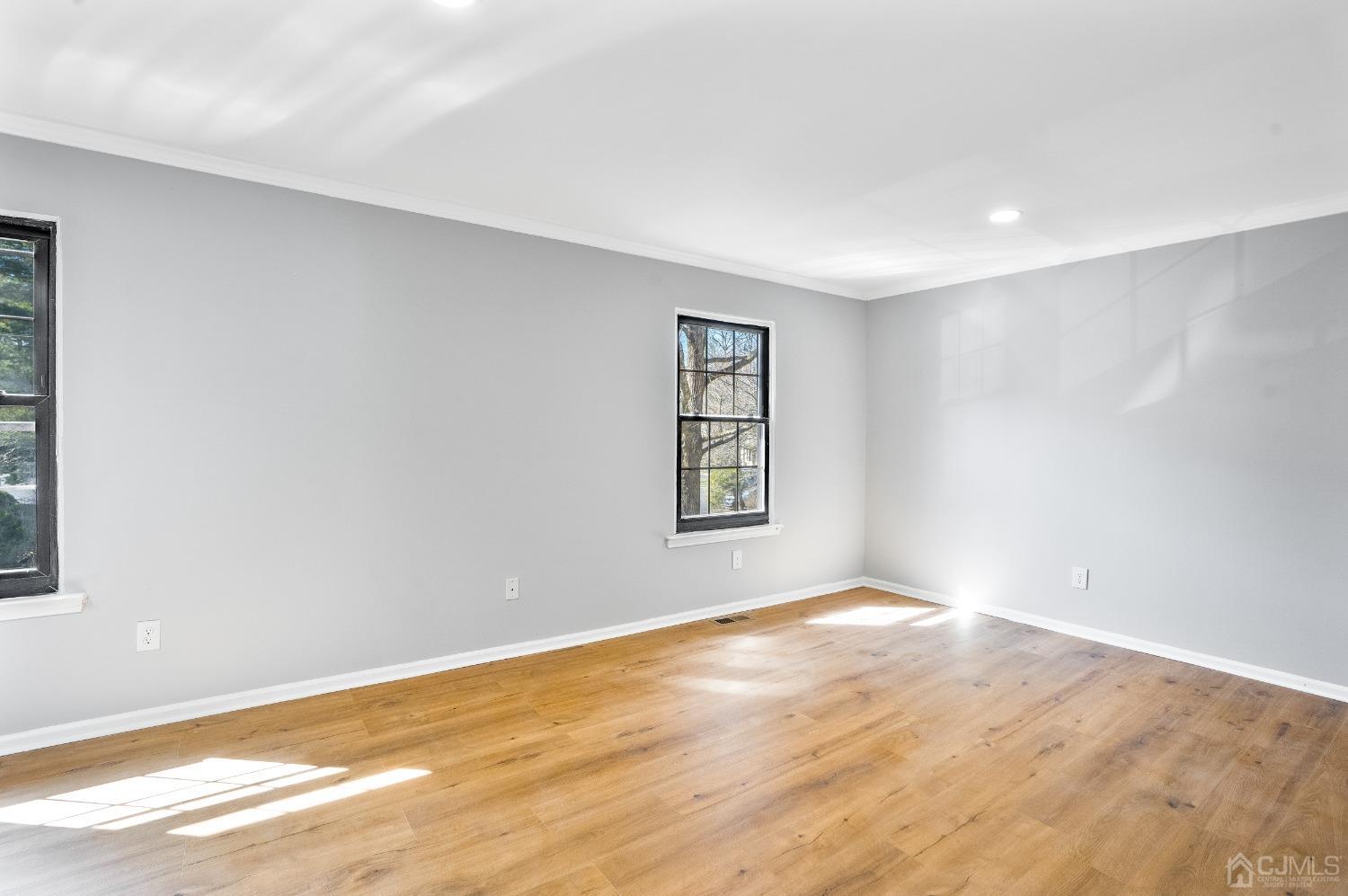 303 Timber Oaks Road Edison, NJ 08820 - Photo 18 of 28 a view of an empty room with window