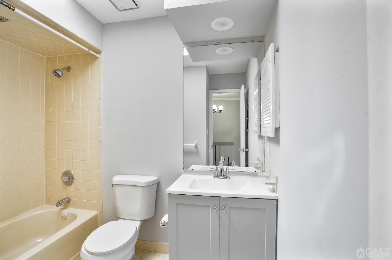 303 Timber Oaks Road Edison, NJ 08820 - Photo 19 of 28 a bathroom with a sink toilet and shower