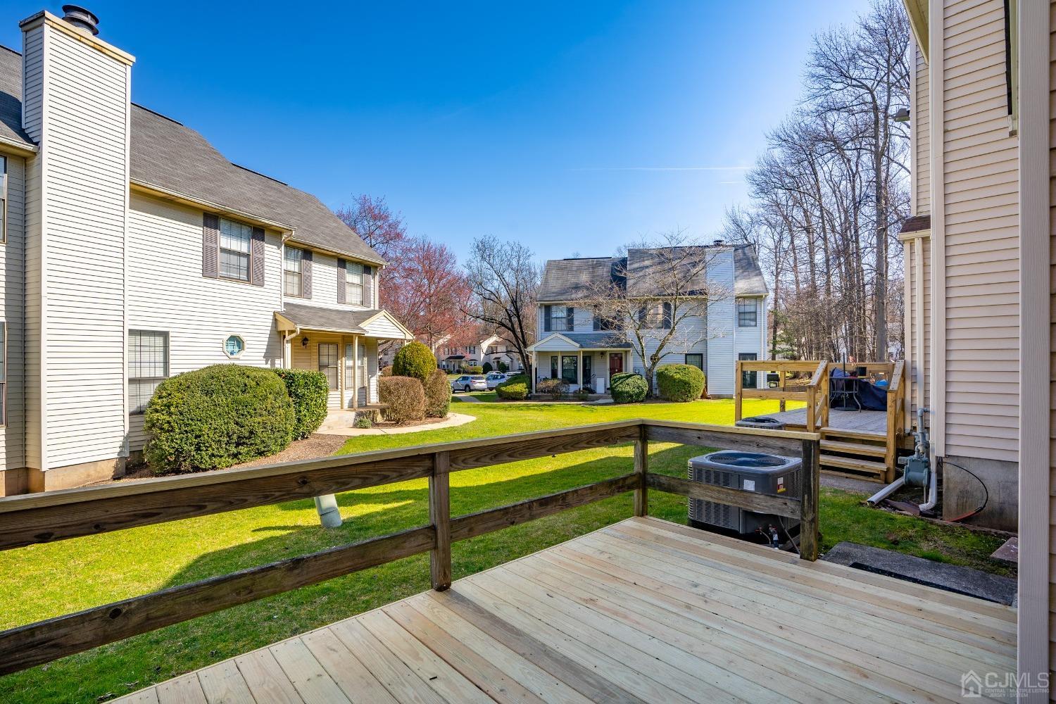 303 Timber Oaks Road Edison, NJ 08820 - Photo 24 of 28 a swimming pool with outdoor seating and yard