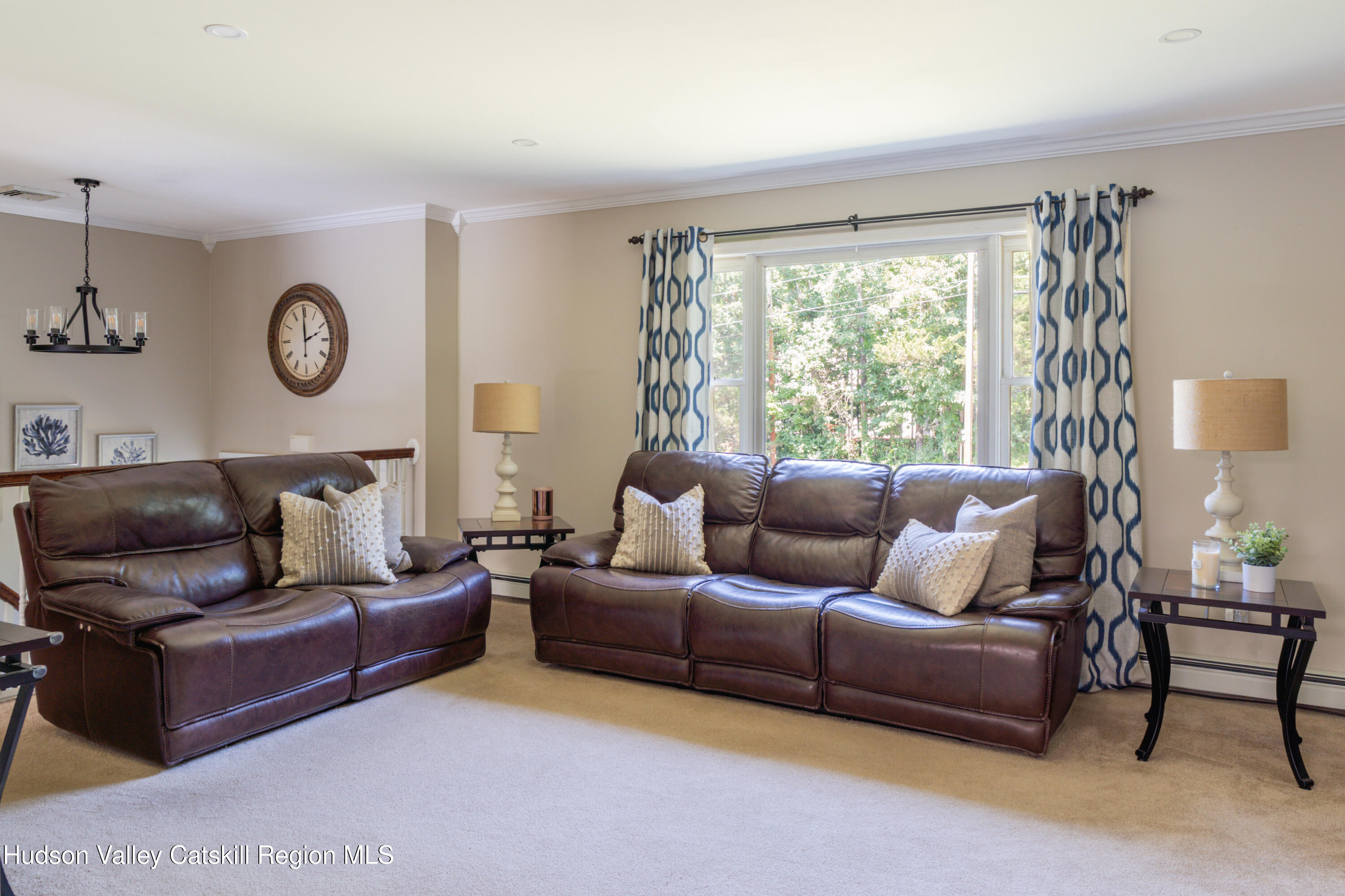 71 Duck Pond Road Stone Ridge, NY 12484 - Photo 11 of 35 a living room with furniture and a large window