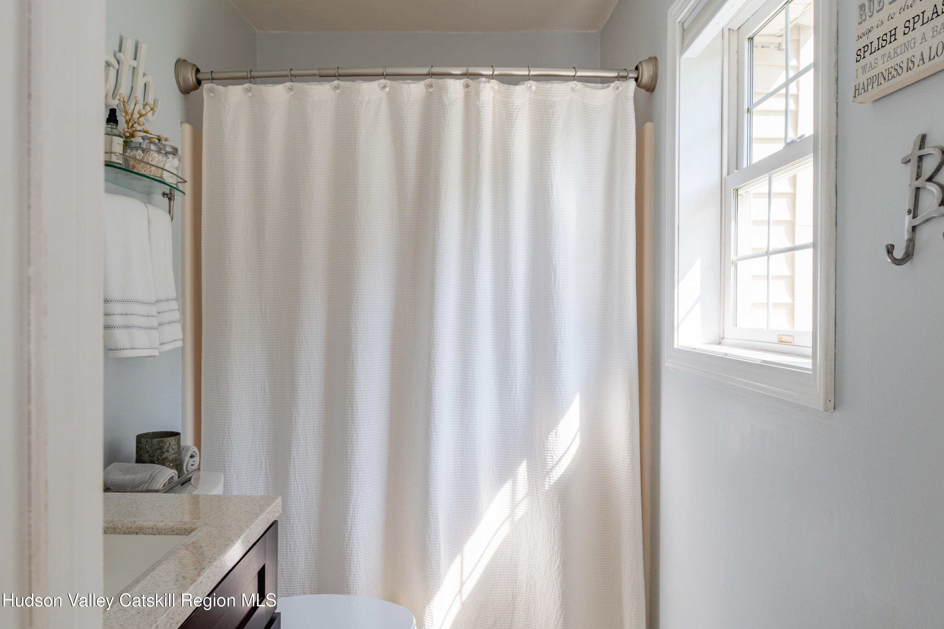 71 Duck Pond Road Stone Ridge, NY 12484 - Photo 15 of 35 a bathroom with a sink and a bath tub