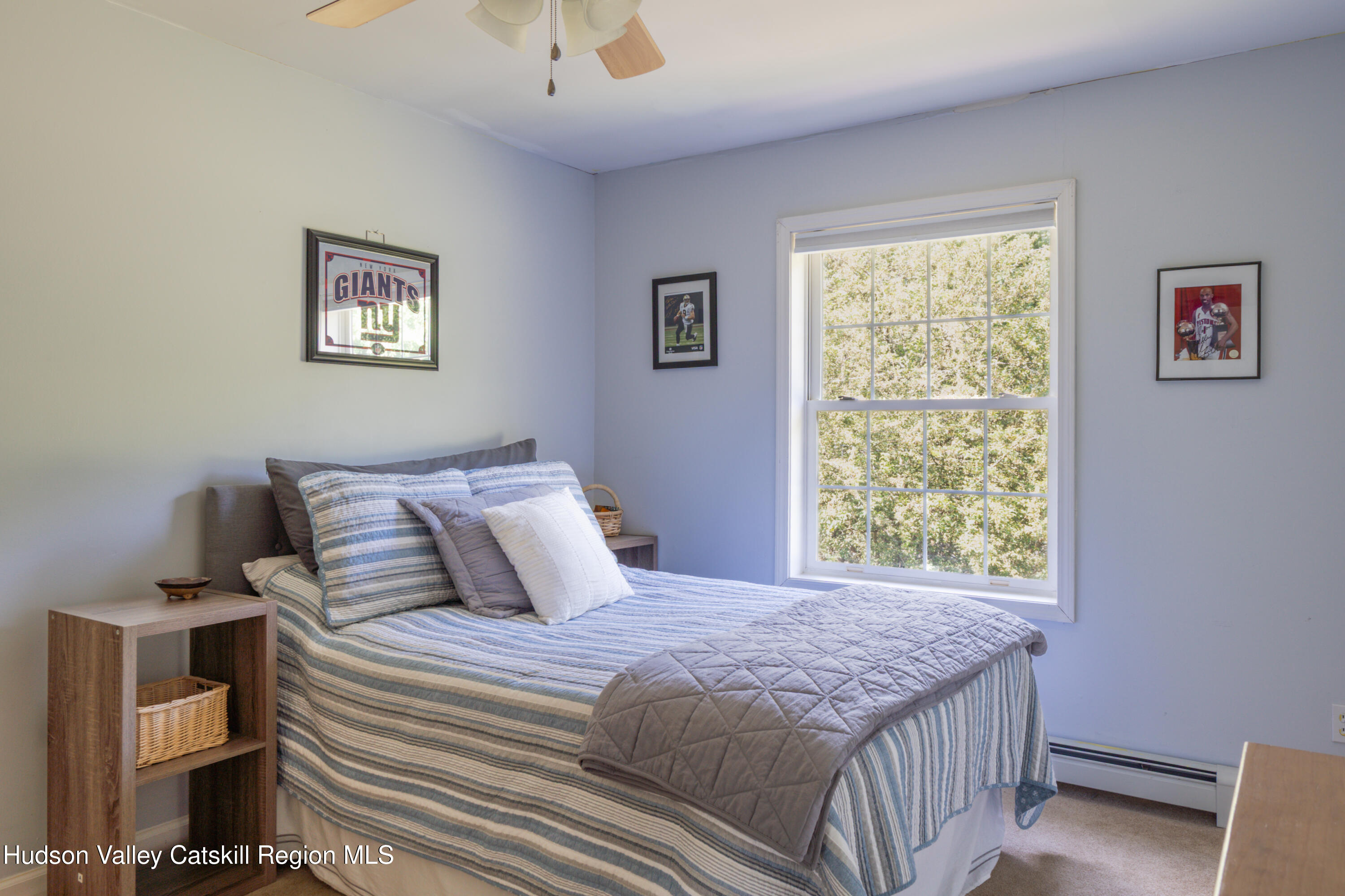 71 Duck Pond Road Stone Ridge, NY 12484 - Photo 17 of 35 a bedroom with a bed and a window