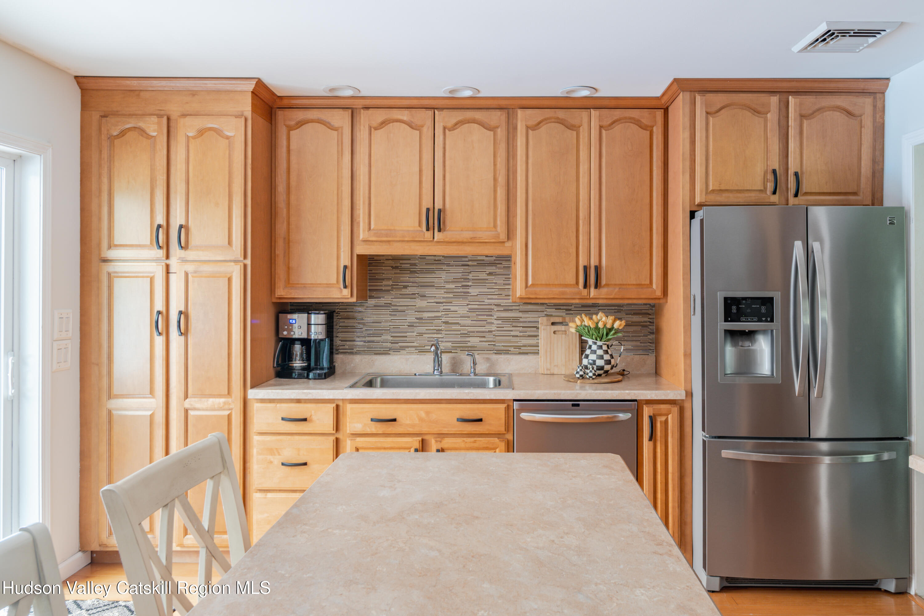 71 Duck Pond Road Stone Ridge, NY 12484 - Photo 2 of 35 a kitchen with stainless steel appliances granite countertop a refrigerator sink and cabinets