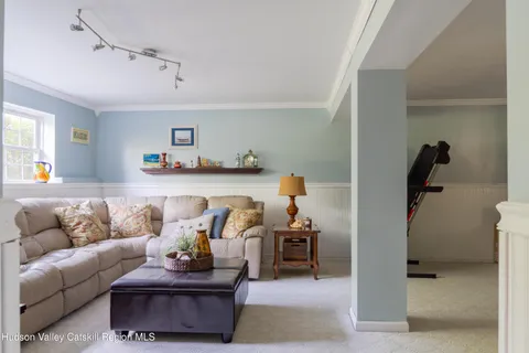 a living room with furniture and a couch