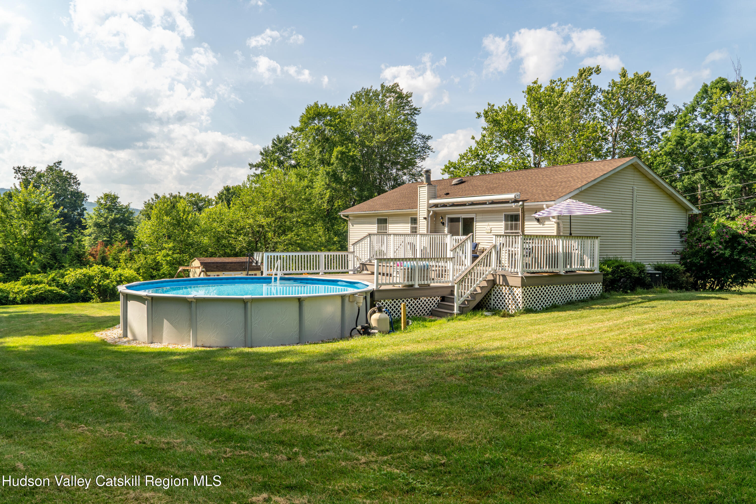 71 Duck Pond Road Stone Ridge, NY 12484 - Photo 29 of 35 a view of a house with a yard balcony and sitting area