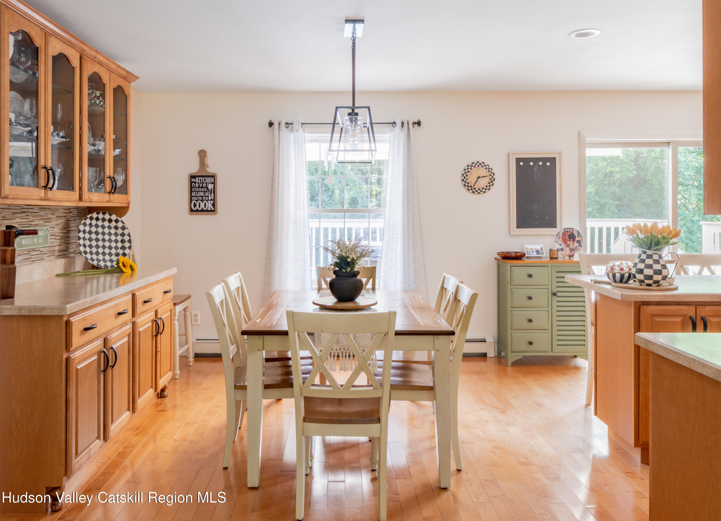 71 Duck Pond Road Stone Ridge, NY 12484 - Photo 3 of 35 a view of a dining room with furniture window and wooden floor