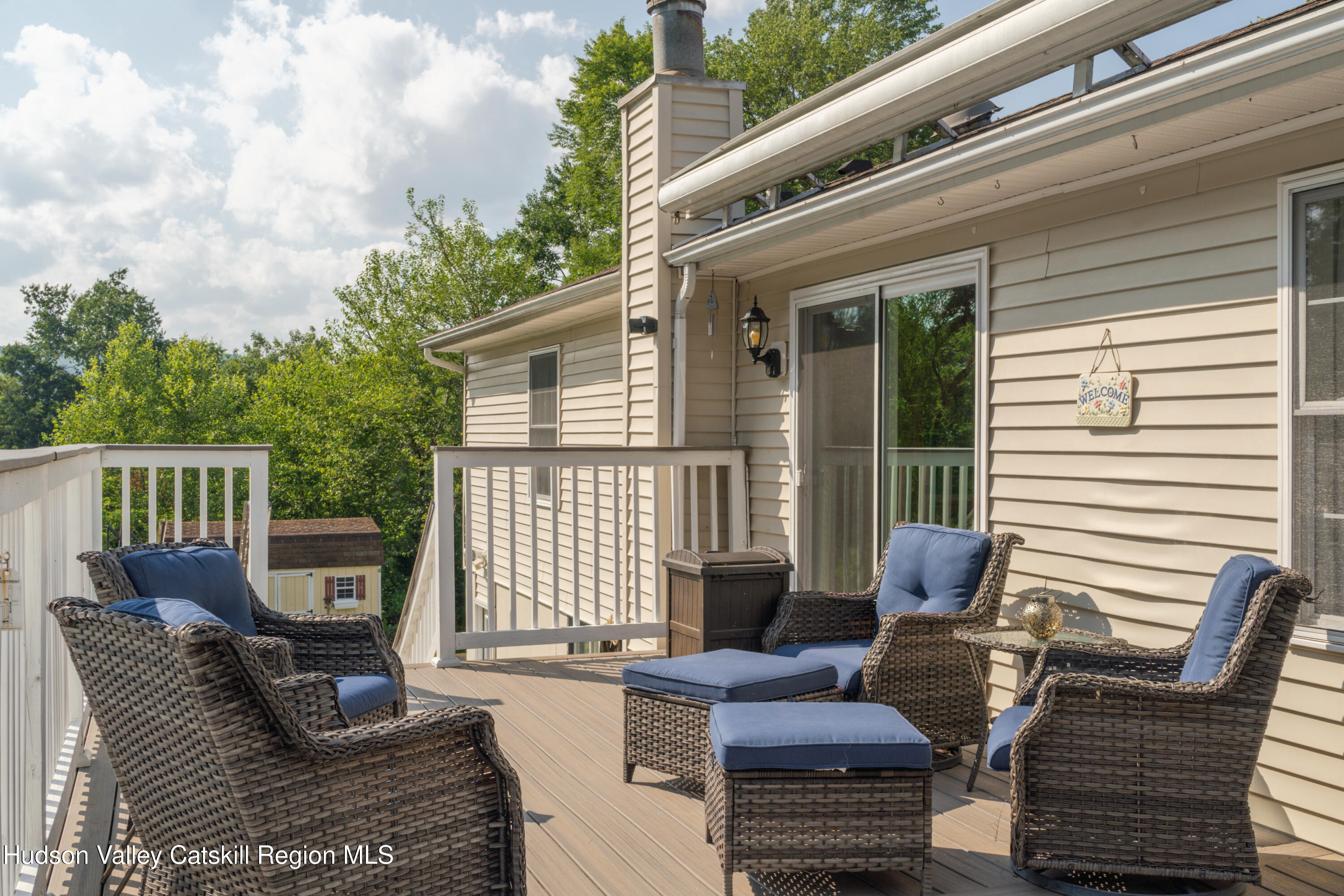 71 Duck Pond Road Stone Ridge, NY 12484 - Photo 31 of 35 a balcony with furniture and a potted plant