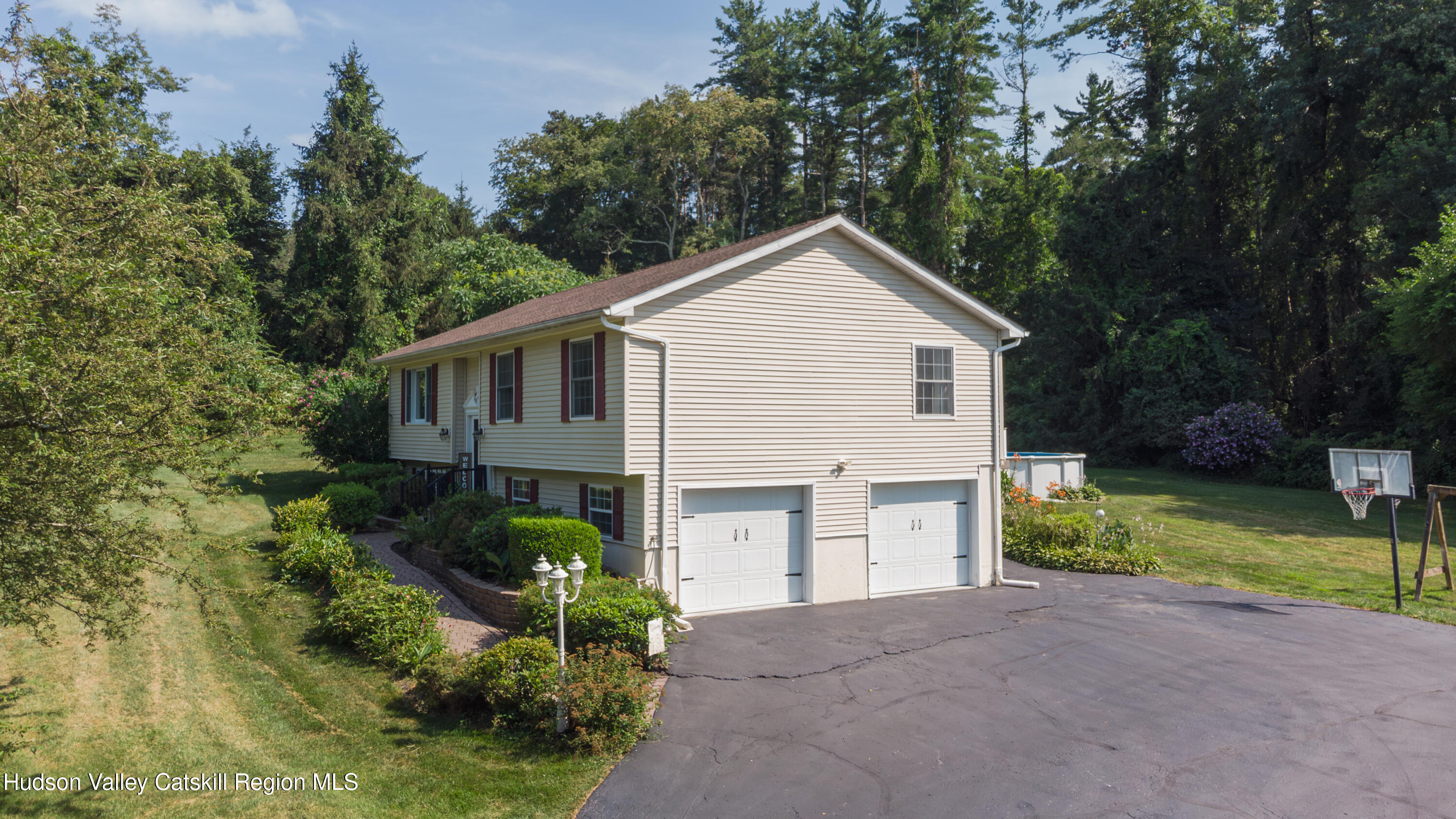 71 Duck Pond Road Stone Ridge, NY 12484 - Photo 35 of 35 a front view of a house with garden