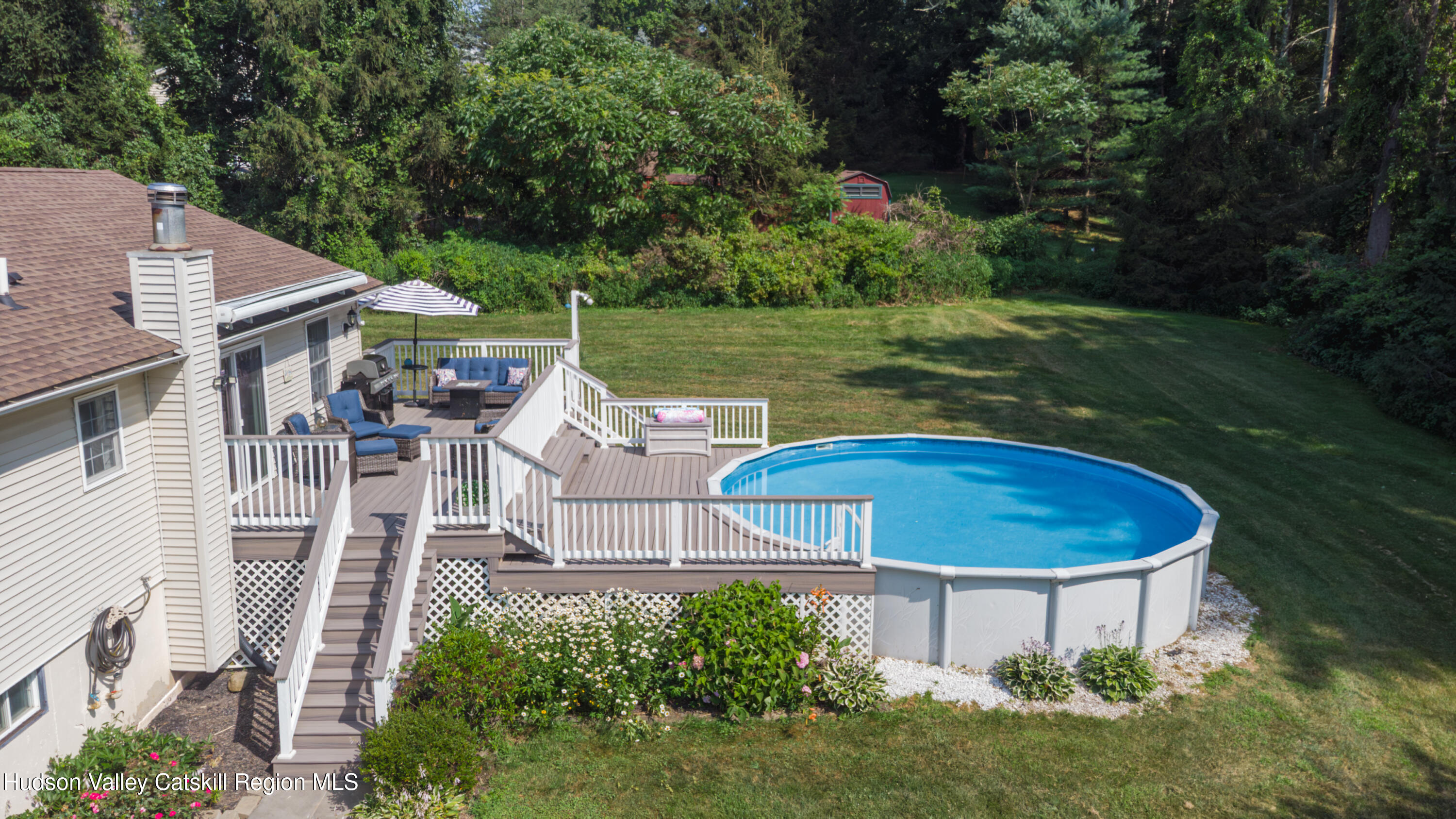 71 Duck Pond Road Stone Ridge, NY 12484 - Photo 4 of 35 a view of a house with backyard porch and garden