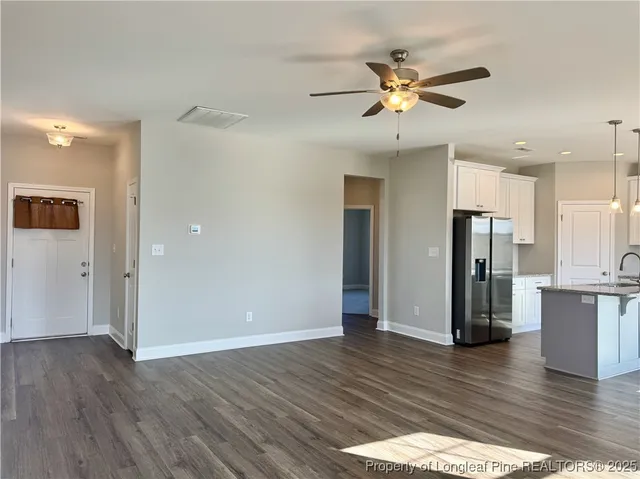 a view of a living room a fireplace with wooden floor