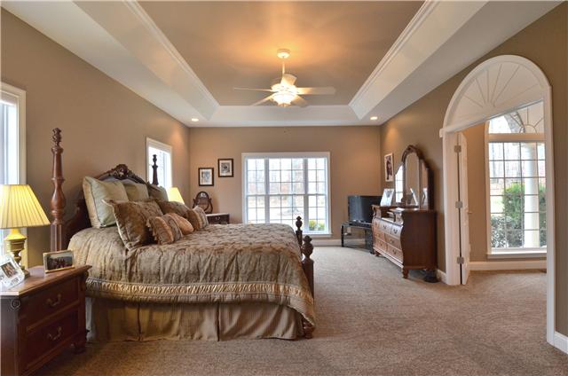 967 Ford Road White Bluff, TN 37187 - Photo 8 of 20 This spacious master bedroom has a tray ceiling, recessed lighting, and a large sitting room/office.