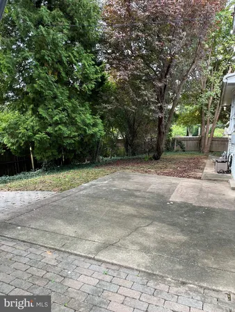 a view of backyard with green space
